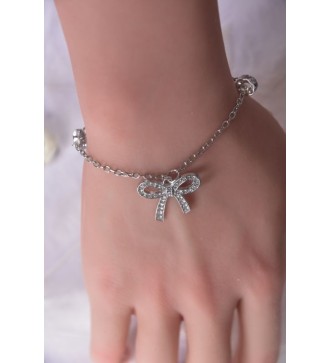 Bracelet argenté : Chaîne , perles strass et nœud élégant