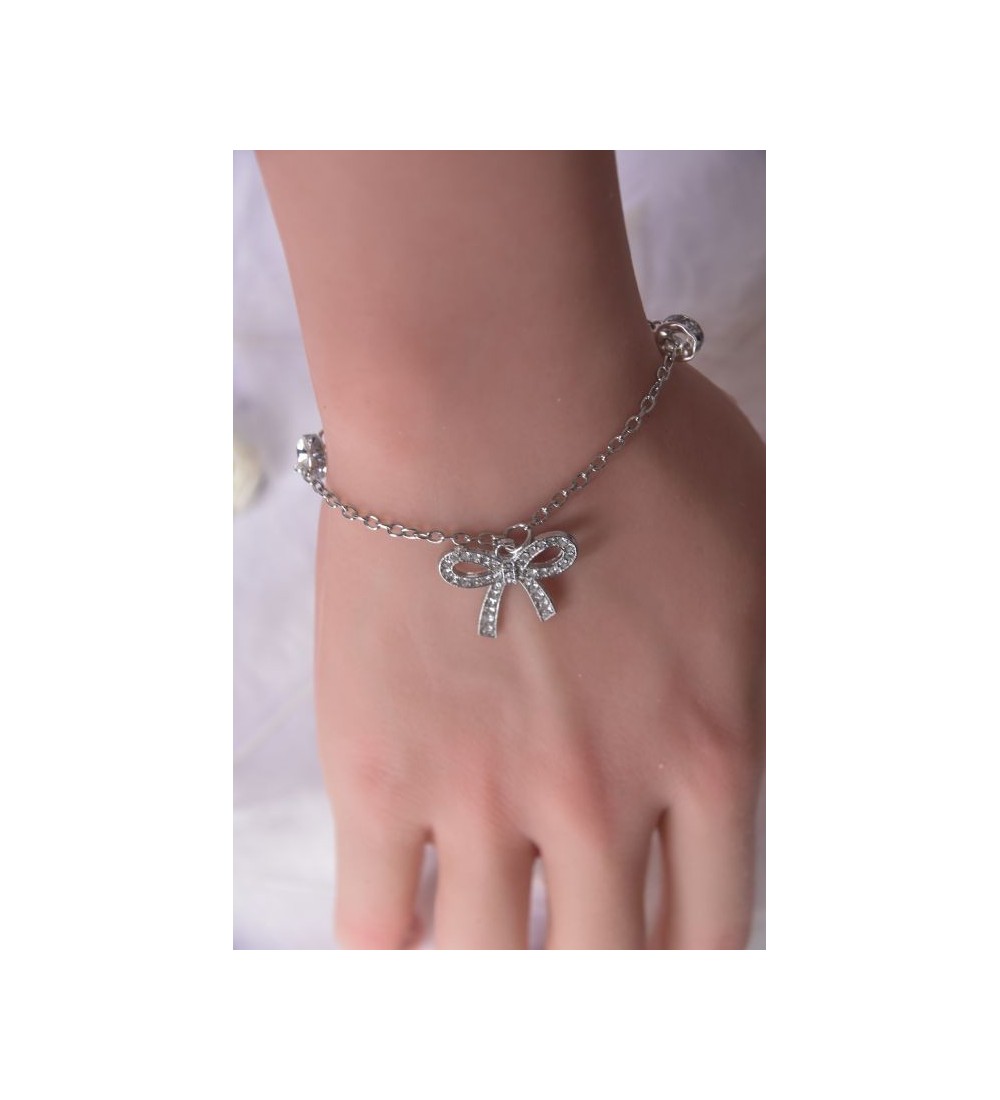 Bracelet argenté : Chaîne , perles strass et nœud élégant