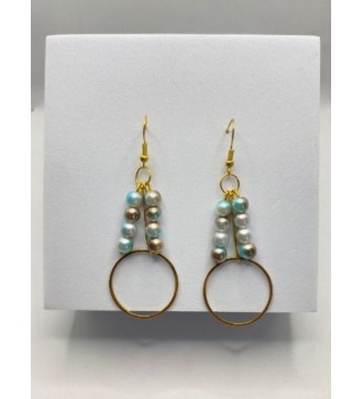 Boucles d'oreilles pendantes dorées avec perles bleu bicolore