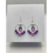 Raiponce – Boucles d’oreilles créoles perles violettes et pendentif pierre en acier inoxydable  Raiponce – Boucles d’oreilles créoles perles violettes et pendentif pierre en acier inoxydable