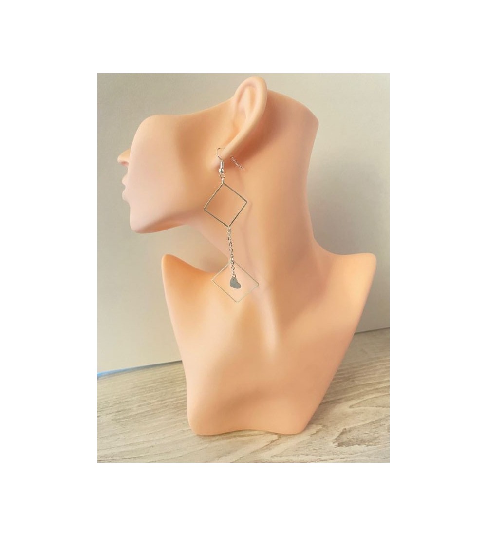 Boucles d'oreilles pendantes argentées avec pendentif coeur