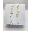 Douceur Élégante – Boucles d’oreilles pendantes perle blanche en acier inoxydable doré Douceur Élégante – Boucles d’oreilles pendantes perle blanche en acier inoxydable doré