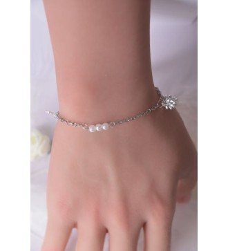 Bracelet argenté avec perles , feuilles et pomme de pin