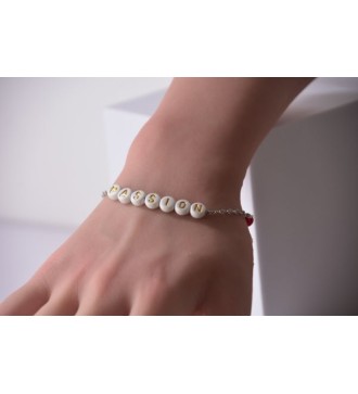 Bracelet argenté avec perles rouges et lettres "PASSION"