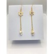 Naval – Boucles d’oreilles barre de bateau et pendentif coquillage pour un style marin chic Naval – Boucles d’oreilles barre de bateau et pendentif coquillage pour un style marin chic