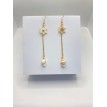 Naval – Boucles d’oreilles barre de bateau et pendentif coquillage pour un style marin chic Naval – Boucles d’oreilles barre de bateau et pendentif coquillage pour un style marin chic