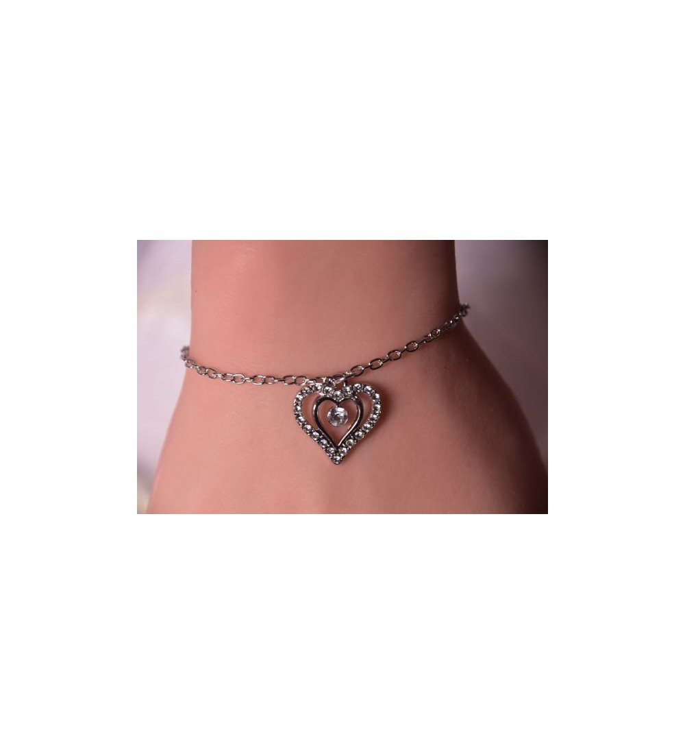 Bracelet argenté avec pendentif cœur en strass