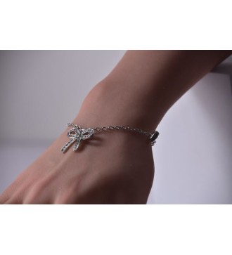 Bracelet argenté : Chaîne , perles strass et nœud élégant