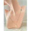 Duo Dauphins – Collier avec pendentif dauphins et perles bleu azur pour un style marin élégant Duo Dauphins – Collier avec pendentif dauphins et perles bleu azur pour un style marin élégant