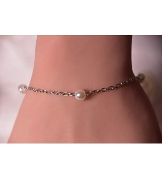 Bracelet argenté en acier avec perles blanches élégantes