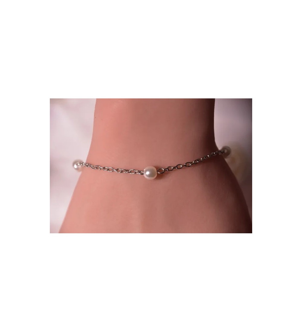 Bracelet argenté en acier avec perles blanches élégantes