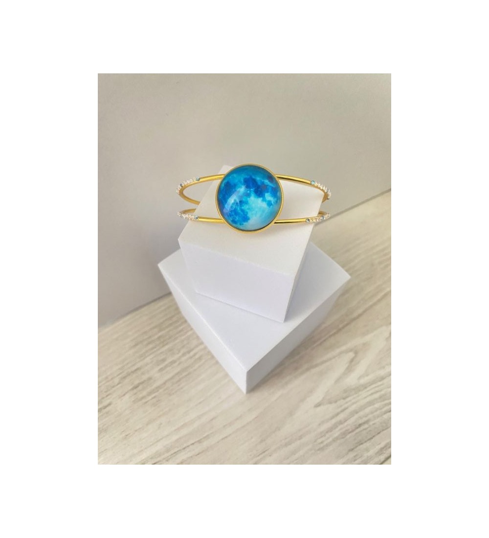 Bracelet jonc ajustable or 24 K avec pendentif bleu marin
