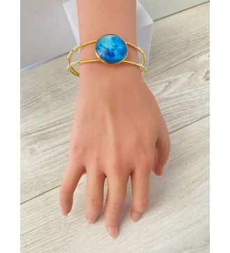 Bracelet jonc ajustable or 24 K avec pendentif bleu marin