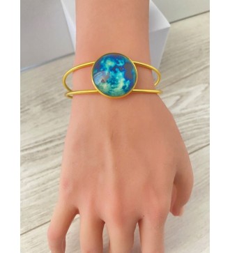 Bracelet jonc ajustable or 24 k avec pendentif bleu nuit