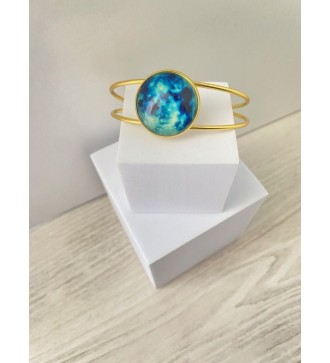 Bracelet jonc ajustable or 24 k avec pendentif bleu nuit