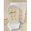 Doubles Lunes – Boucles d’oreilles pendantes dorées et argentées au design céleste Doubles Lunes – Boucles d’oreilles pendantes dorées et argentées au design céleste