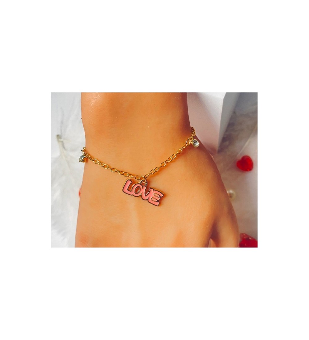 Bracelet doré avec pendentif "LOVE" et breloque strass