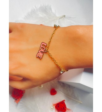Bracelet doré avec pendentif "LOVE" et breloque strass