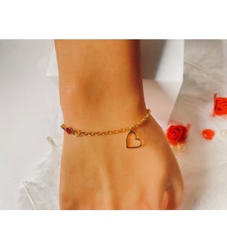 Bracelet doré avec pendentif cœur et perles élégantes