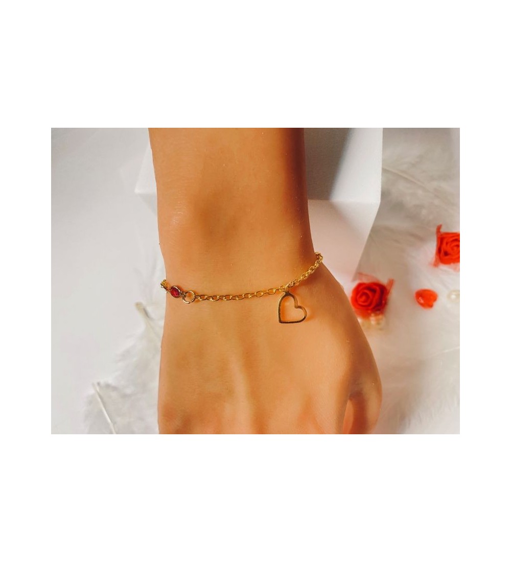 Bracelet doré avec pendentif cœur et perles élégantes
