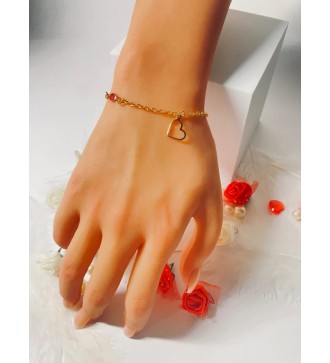 Bracelet doré avec pendentif cœur et perles élégantes