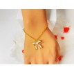 Noeud Blanc – Bracelet plaqué or 24 K avec pendentif nœud élégant, perles et pierre blanche Noeud Blanc – Bracelet plaqué or 24 K avec pendentif nœud élégant, perles et pierre blanche