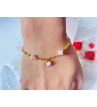 Bracelet doré avec perles rose et pendentif cœur élégant