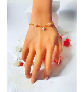 Bracelet doré avec perles rose et pendentif cœur élégant