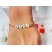 Love – Bracelet ajustable pendentifs cœurs et perles en acier inoxydable doré Love – Bracelet ajustable pendentifs cœurs et perles en acier inoxydable doré