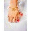 Noeud Lié – Bracelet ajustable perles rouges et pendentif acier inoxydable doré Noeud Lié – Bracelet ajustable perles rouges et pendentif acier inoxydable doré