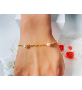 Bracelet doré en acier avec perles couleur pêche