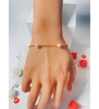 Bracelet doré en acier avec perles couleur pêche