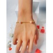 Bracelet doré en acier avec perles couleur pêche élégantes Bracelet doré en acier avec perles couleur pêche élégantes