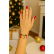 Flocon Doré – Bracelet de Noël en acier avec charms festifs  Flocon Doré – Bracelet de Noël en acier avec charms festifs