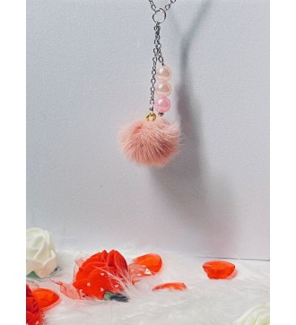 Collier argenté avec perles rose pâle et pompon rose