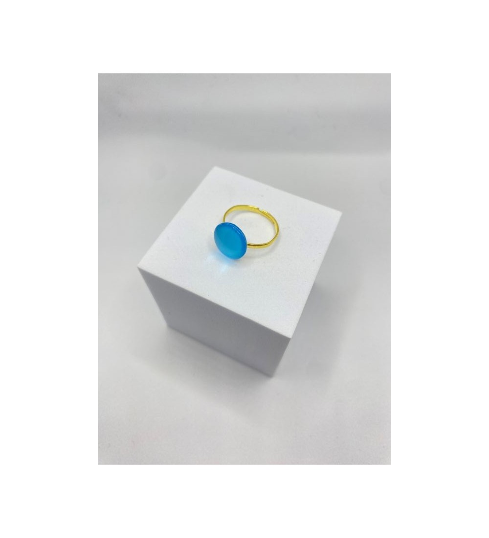 Bague ajustable  en acier inoxydable doré avec verre bleu azur