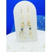 Mystère des Astres – Boucles d’oreilles pendantes avec perles blanches et pendentifs célestes Mystère des Astres – Boucles d’oreilles pendantes avec perles blanches et pendentifs célestes