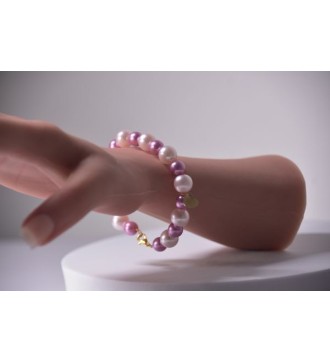 Bracelet en perles rose pâle et violettes avec coeur doré