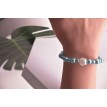 Bracelet Océan Éclatant en perles bleu ciel et pendentif coquillage blanc Bracelet Océan Éclatant en perles bleu ciel et pendentif coquillage blanc