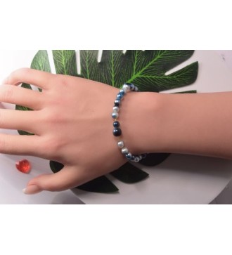 Bracelet en perles bleu tacheté de blanc élégant et unique