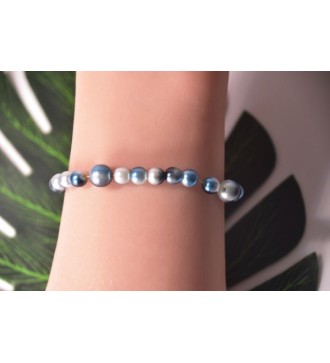 Bracelet en perles bleu tacheté de blanc élégant et unique
