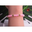 Bracelet Pastel et Or en perles roses et anneaux dorés chic et élégant Bracelet Pastel et Or en perles roses et anneaux dorés chic et élégant