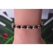 Chic en Noir et Doré – Bracelet en perles noires et dorées, élégant et intemporel Chic en Noir et Doré – Bracelet en perles noires et dorées, élégant et intemporel