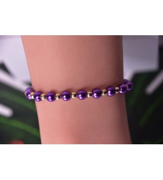 Bracelet en perles violettes et dorées , élégant et tendance