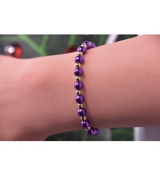 Bracelet en perles violettes et dorées , élégant et tendance