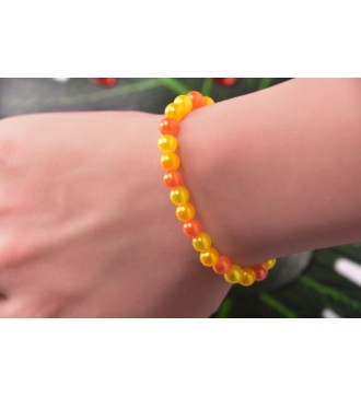 Bracelet en perles jaune et oranges , tendance et unique