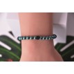 Bracelet Vert Sapin en perles vert foncé et rondelles noires élégantes Bracelet Vert Sapin en perles vert foncé et rondelles noires élégantes