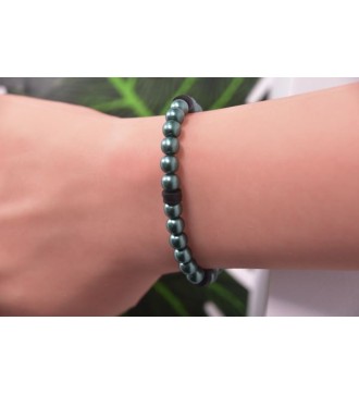 Bracelet en perles vert sapin et rondelles noires élégantes