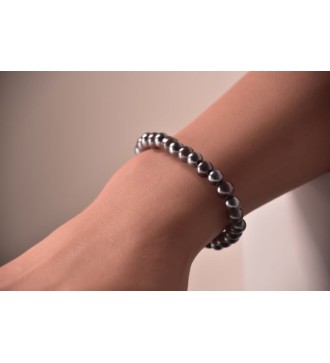 Bracelet en perles grises , argentées et platine élégant