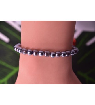 Bracelet en perles grises , argentées et platine élégant